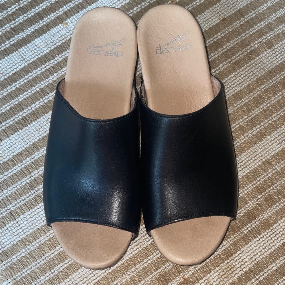 Dansko Black and Tan Leather Clogs